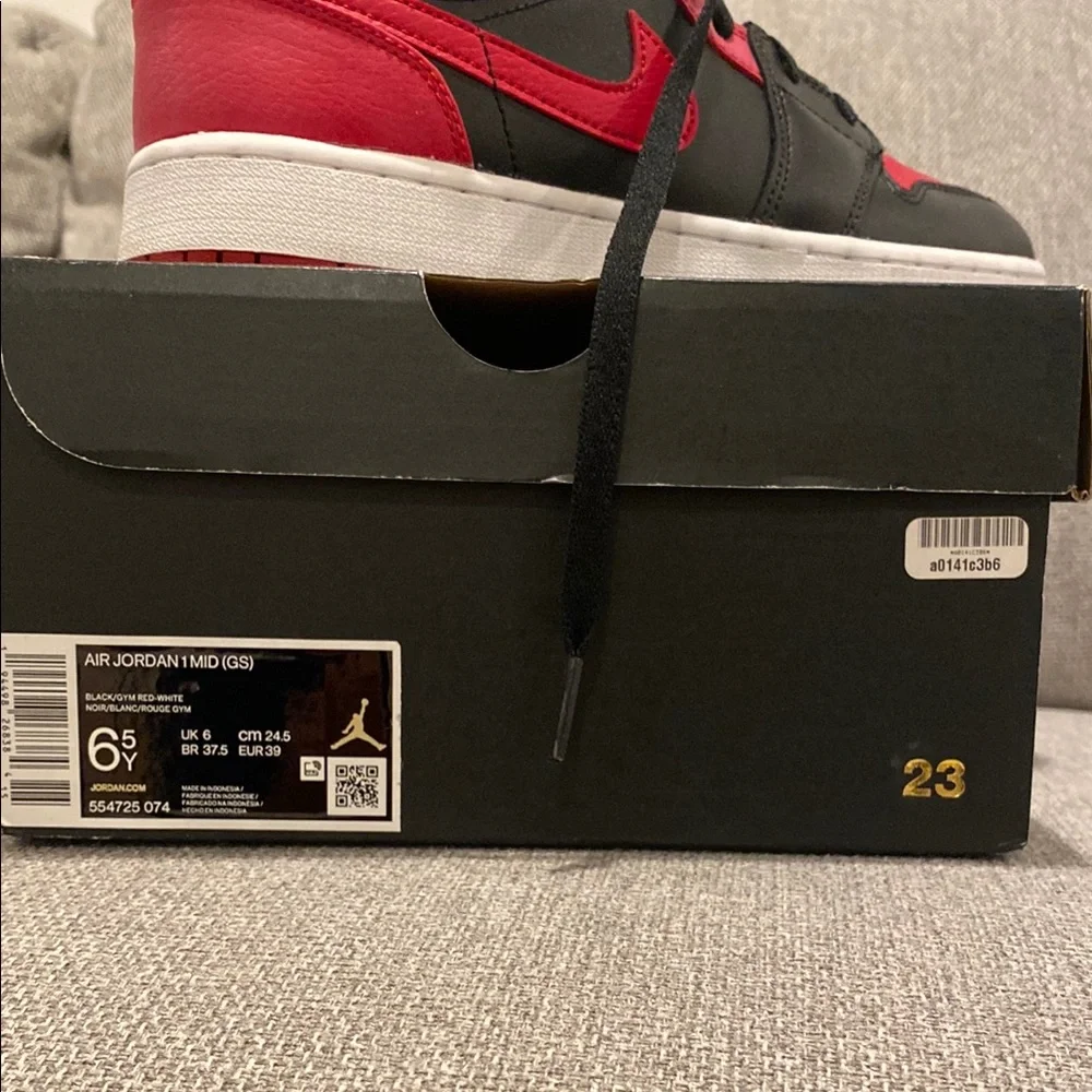 Nike Air Jordan 1 Mid Red and Black High-Top Sneakers